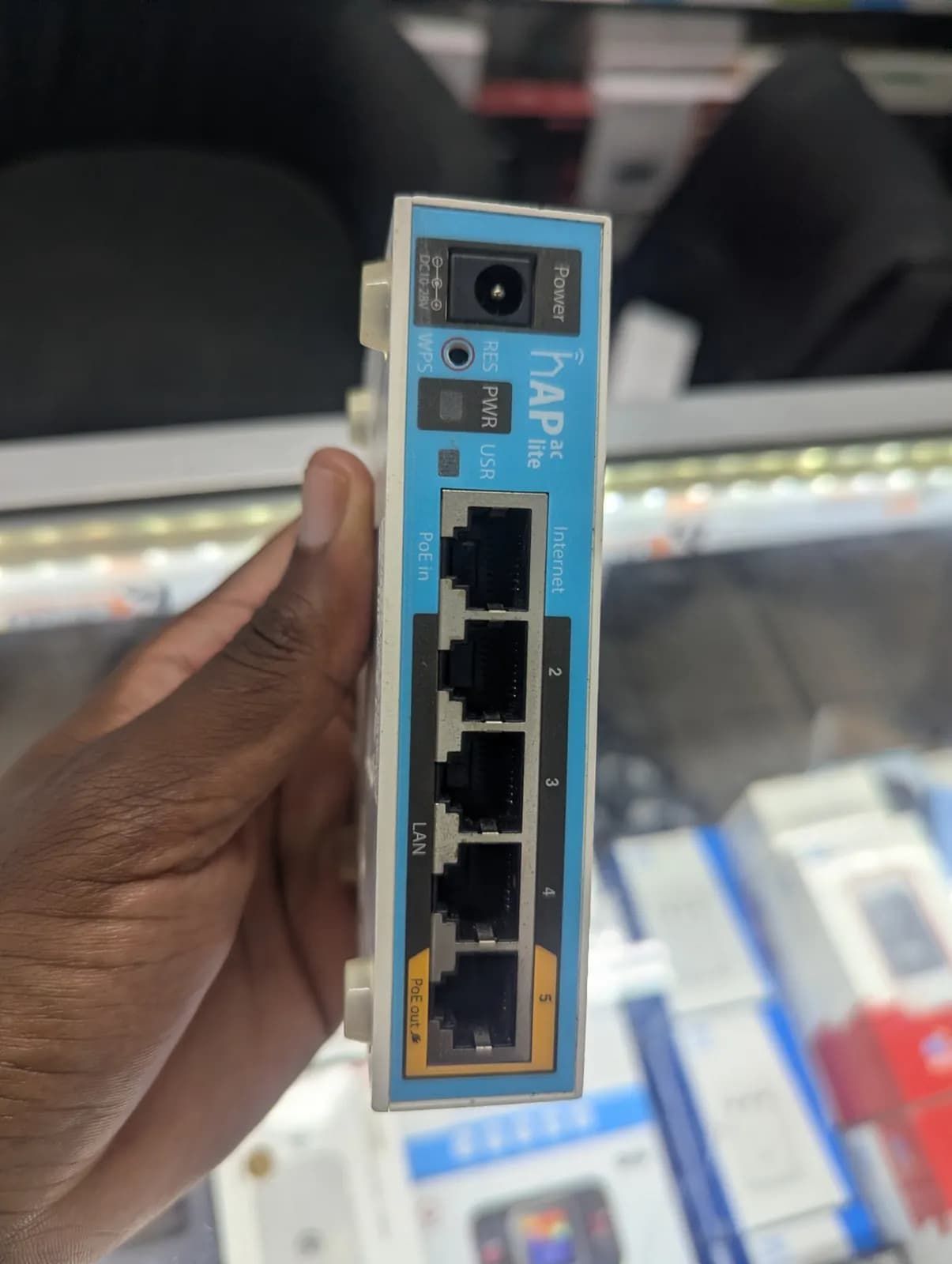 MikroTik router prepared to sit behind a Starlink router in Harare, Zimbabwe